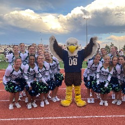 The PCHS Cheer Team poses with their mascot.